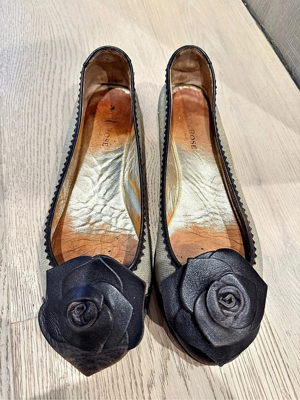 Taryn Rose Floral Flower Flats in Black & Gold